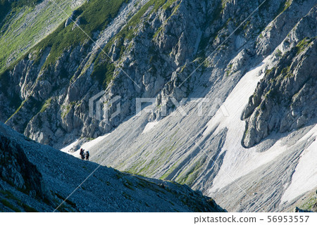 Climbers going through the Tateyama mountain range in the Northern Alps 56953557