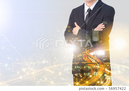 Double exposure of businessman cross arm 56957422