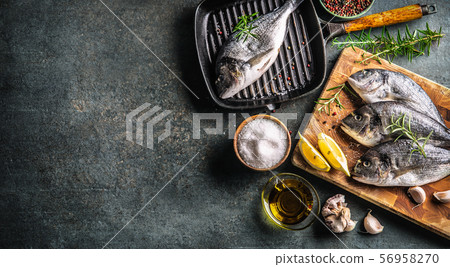 Mediterranean fish bream with spices salt herbs Mediterranean fish bream with spices salt herbs 56958270