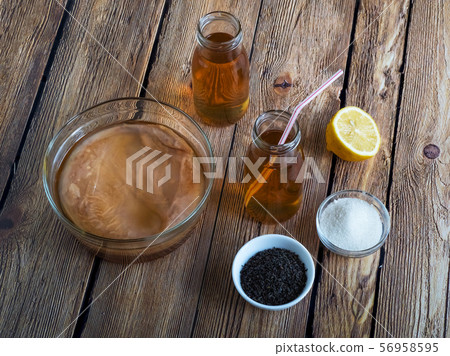 Kombucha by fermenting tea with symbiotic culture Kombucha by fermenting tea with symbiotic culture 56958595