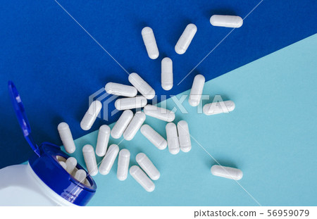 Different pharmaceutical pills and capsules. Different pharmaceutical pills and capsules. 56959079