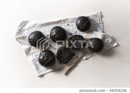 Black bread buns. Strange food. Healthy eating Black bread buns. Strange food. Healthy eating 56959286