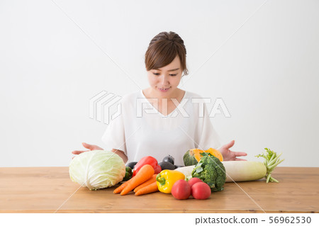 Vegetables and ladies Vegetables and ladies 56962530
