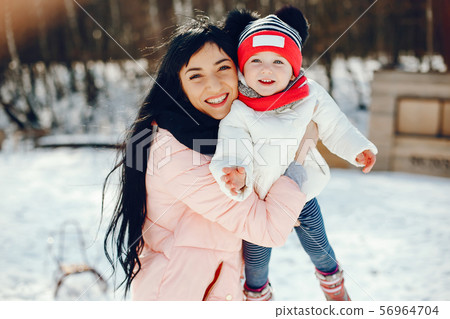 Mother with little daughter 56964704