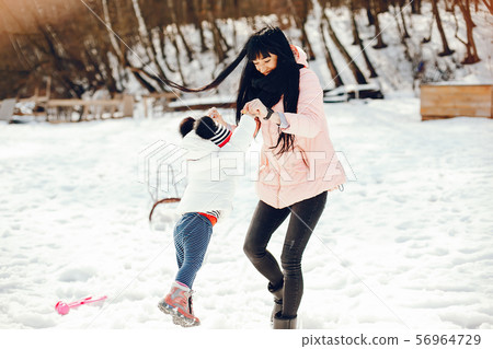 Mother with little daughter 56964729