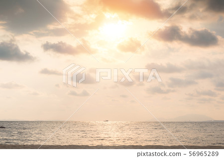 Beautiful Landscape of sunset and beautiful sea from tropical island beach in Thailand,Vacations in Dream Destination Concept,Warm Tone Beautiful Landscape of sunset and beautiful sea from tropical island beach in Thailand,Vacations in Dream Destination Concept,Warm Tone 56965289