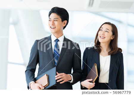Business image Male employee Female employee 56967779