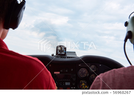 Cockpit view of aerobatic sport airplane with 56968267