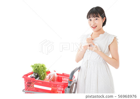 Superwoman thinking young woman Superwoman thinking young woman 56968976