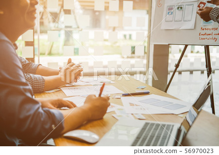 user experience UX designer designing web on smart phone layout. UI developer planning working on mobile application prototype user experience UX designer designing web on smart phone layout. UI developer planning working on mobile application prototype 56970023