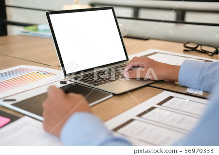 user experience UX designer designing web on smart phone layout. UI developer planning working on mobile application prototype 56970333