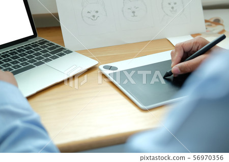 artist graphic designer drawing artwork. creative design workplace 56970356