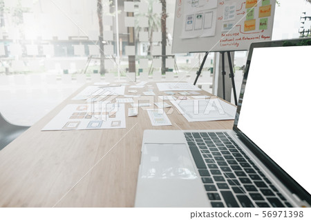 user experience UX designer designing web on smart phone layout. UI developer planning working on mobile application prototype 56971398