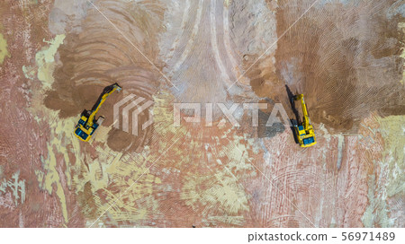 Aerial view group of excavator working on a 56971489