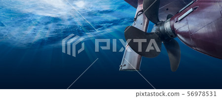 Propeller and rudder of big ship underway view 56978531