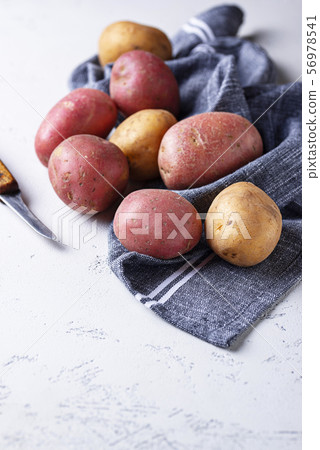 Various sorts of raw organic potatoes 56978541