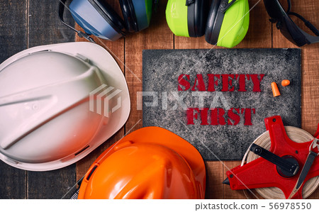Safety first sign with personal protective 56978550