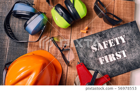 Safety first sign with personal protective 56978553