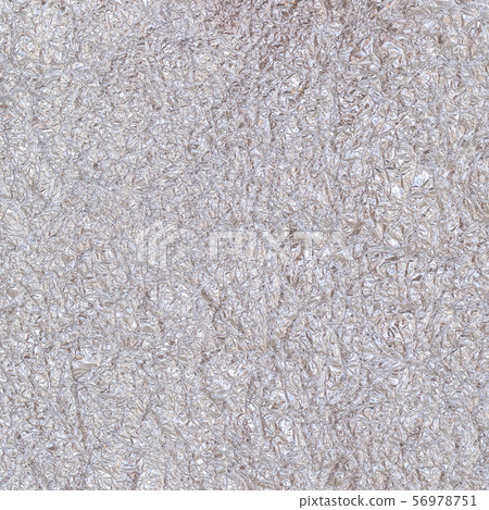 Shiny silver grey paper foil decorative wall paper texture background Shiny silver grey paper foil decorative wall paper texture background 56978751