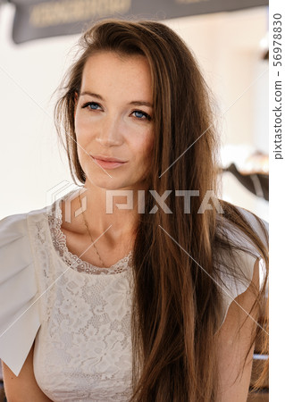 Closeup portrait of woman with freckles without Closeup portrait of woman with freckles without 56978830