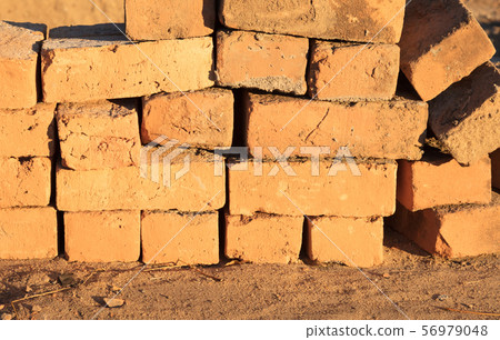 Mud bricks factory in Madagascar Mud bricks factory in Madagascar 56979048