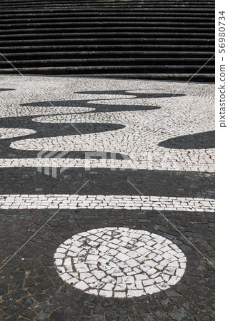 Detail of the cobblestones pavement Detail of the cobblestones pavement 56980734