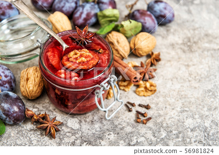 Plums marmalade walnuts spices Fruit jam 56981824