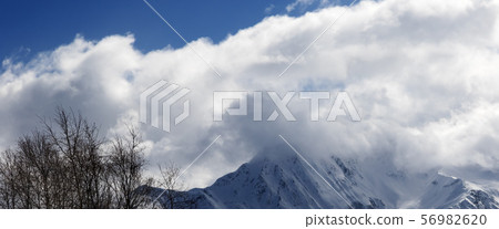 Winter mountains in clouds at nice day 56982620