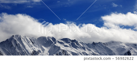 Winter snow mountains at nice sunny day Winter snow mountains at nice sunny day 56982622