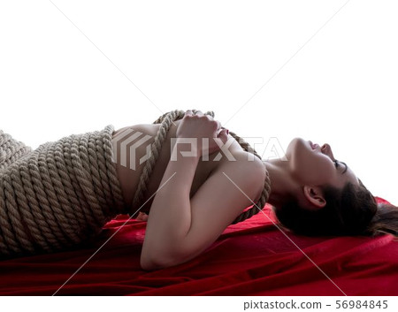 Woman tied in style of Japanese bondage Woman tied in style of Japanese bondage 56984845
