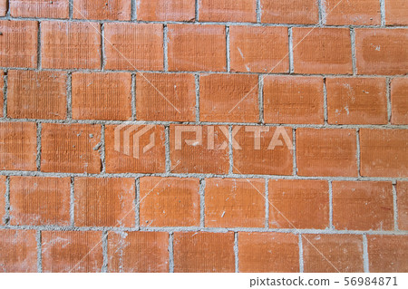 Plank of bricks being built on a building site Plank of bricks being built on a building site 56984871