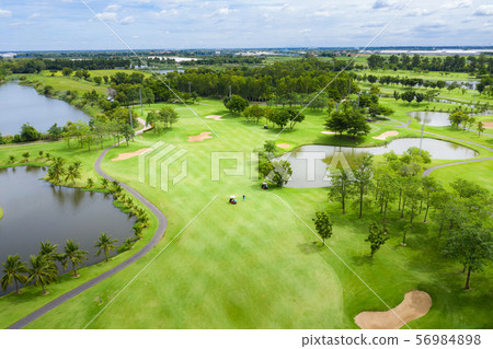 Aerial view of pound on golf course with player, Aerial view of pound on golf course with player, 56984898
