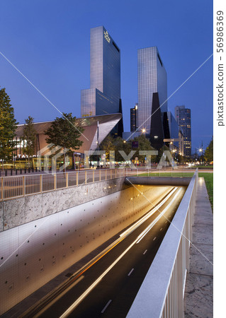 Dynamic cityscape of Rotterdam at twilight 56986369