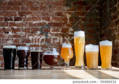 Glasses of different kinds of beer, time for oktoberfest Glasses of different kinds of beer, time for oktoberfest 56986818