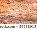 Old brick wall texture and background, orange block and increase exposure in the center 56988915