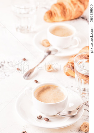 Traditional breakfast with fresh croissants on Traditional breakfast with fresh croissants on 56989909