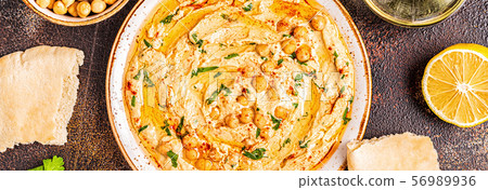Hummus, chickpea dip, with spices. Hummus, chickpea dip, with spices. 56989936