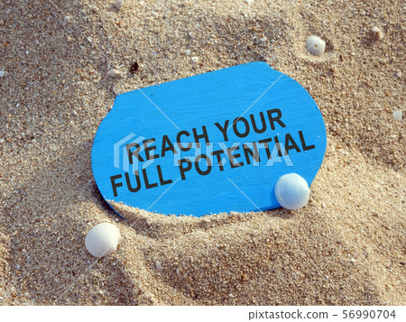 Reach your full potential sign on a plank. Reach your full potential sign on a plank. 56990704