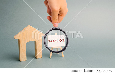 A poster with the word Taxation A poster with the word Taxation 56990879