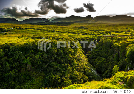 Rural Landscape With Remote Houses At The Old Man Storr Formation On The Isle Of Skye In Scotland 56991040