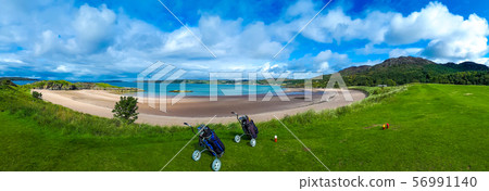 Golf Course With Carts And Clubs At The White Sand Beach Of Gairloch In Scotland 56991140