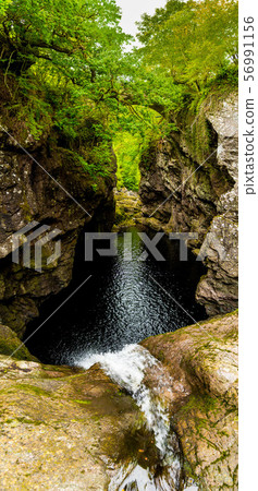 Waterfall Falls Of Foyers In Narrow Gorge With Old Stone Bridge At Loch Ness In Scotland 56991156