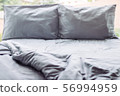 Messy grey hotel bed, honeymoon, background 56994959