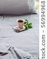 good morning, chill witn coffee in grey bed 56994968
