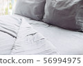 grey linens bed, background 56994975