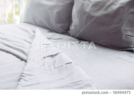 grey linens bed, background 56994975