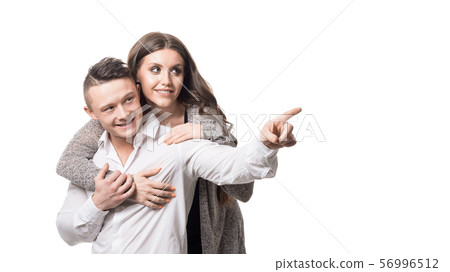 Married couple. Woman holding man and looking by side. Couple goal, happiness, feature, dream and 56996512