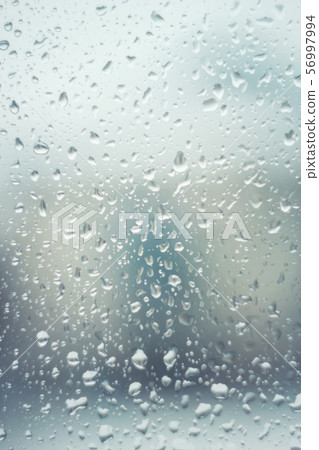Rain drops on glass with Rain drops on glass with 56997994