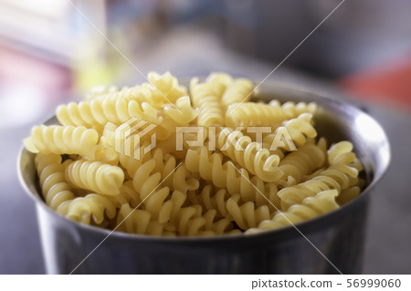 Fusili pasta in stainless container Fusili pasta in stainless container 56999060