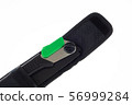Closeup of a folding handsaw in pouch 56999284